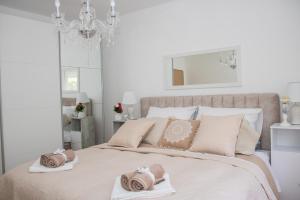 מיטה או מיטות בחדר ב-Apartman Miletic
