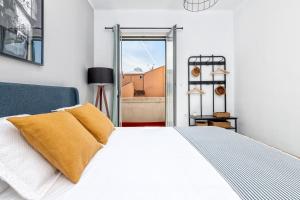 Posteľ alebo postele v izbe v ubytovaní iloftmalaga Premium Calle Granada