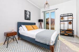 Posteľ alebo postele v izbe v ubytovaní iloftmalaga Premium Calle Granada