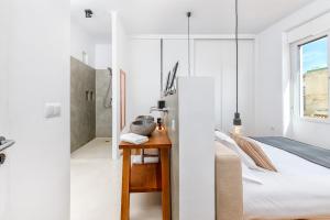 Posteľ alebo postele v izbe v ubytovaní iloftmalaga Premium Calle Granada