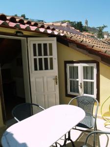 Patio nebo venkovní prostory v ubytování Filyra Pension