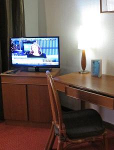 TV a/nebo společenská místnost v ubytování Hotel Grand Continental Kuching