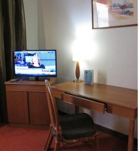 TV a/nebo společenská místnost v ubytování Hotel Grand Continental Kuching