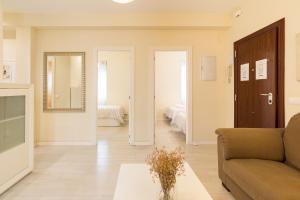 Posteľ alebo postele v izbe v ubytovaní Alferez I by ELE Apartments