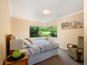 Krevet ili kreveti u jedinici u objektu Acacia Bay Getaway - Lake Taupo Holiday Home