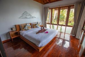 Voodi või voodid majutusasutuse Coral View Resort toas