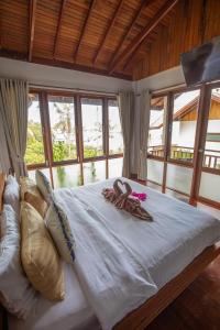 Voodi või voodid majutusasutuse Coral View Resort toas
