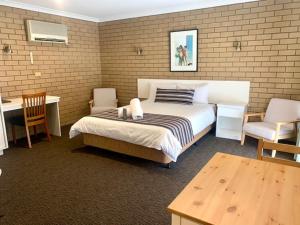 Posteľ alebo postele v izbe v ubytovaní Albury City Motel