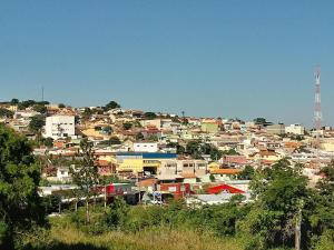 a group of buildings on top of a hill at Hotel Canaã Express in Jarinu