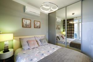 Un pat sau paturi într-o cameră la Apartament Szyndzielnia