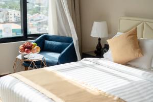 Giường trong phòng chung tại Hotel Sanchaung