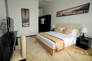 Giường trong phòng chung tại Hotel Sanchaung