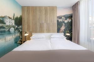 Postel nebo postele na pokoji v ubytování Boutique Hotel Esplanade