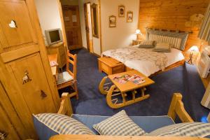 Postel nebo postele na pokoji v ubytování Le Chalet d'en Hô