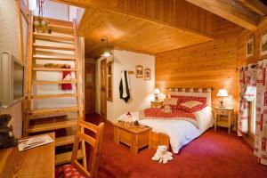 Postel nebo postele na pokoji v ubytování Le Chalet d'en Hô