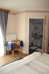 Krevet ili kreveti u jedinici u okviru objekta Hotel Lang