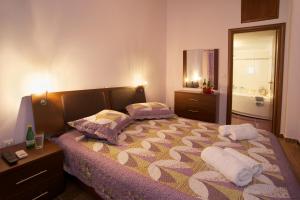 Posteľ alebo postele v izbe v ubytovaní Sunrise Villa