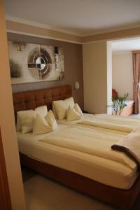 Krevet ili kreveti u jedinici u okviru objekta Hotel Lang