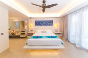 Ліжко або ліжка в номері Hotel Le Duc de Praslin