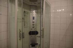 a bathroom with a shower and a toilet at Bickbargen in Halstenbek