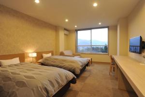 Postel nebo postele na pokoji v ubytování HESTA Hakone - GUEST HOUSE -