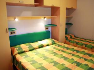 Postel nebo postele na pokoji v ubytování Camping Free Beach