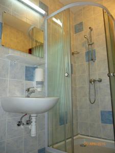 Koupelna v ubytování Mátraházai Üdülőház + 29 fotografií