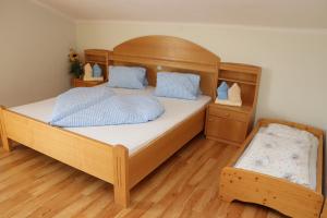 Llit o llits en una habitació de Gasthof Lamprechtbauer