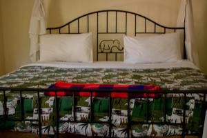 Llit o llits en una habitació de Octagon Lodge