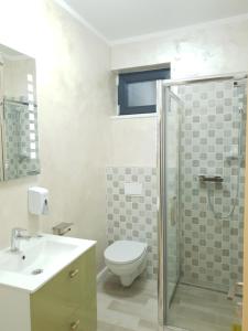 Koupelna v ubytování Villa George