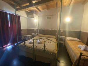 Postel nebo postele na pokoji v ubytování Park Hotel Serenissima