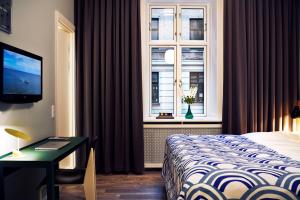 Postel nebo postele na pokoji v ubytování Coco Hotel
