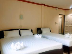 Tempat tidur dalam kamar di Golden Bee PhiPhi