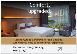 Letto o letti in una camera di The Act Hotel Sharjah