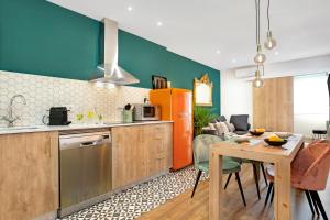 Kuchyňa alebo kuchynka v ubytovaní Glam Penthouse Barcelona