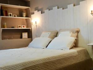 Postel nebo postele na pokoji v ubytování Un Patio en Luberon