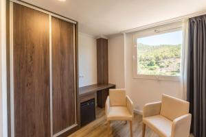 Posezení v ubytování Hotel Rosaleda del Mijares