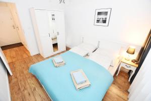 Posteľ alebo postele v izbe v ubytovaní Apartament "Bliżej Morza 30" + 20 fotografií