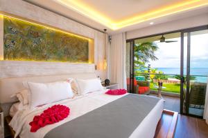 Ліжко або ліжка в номері Hotel Le Duc de Praslin