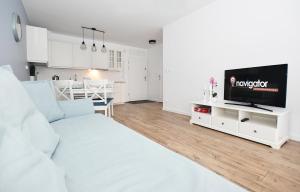 Telewizja i/lub zestaw kina domowego w obiekcie Apartament "Bliżej Morza 30"