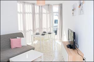 Televízia a/alebo spoločenská miestnosť v ubytovaní Apartamento luminoso en el centro