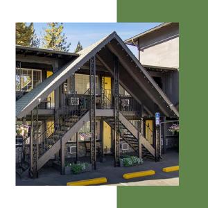 a building with stairs on the side of it at Heavenly Inn Lake Tahoe in South Lake Tahoe