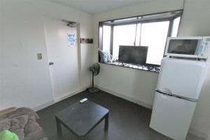 Kuchyň nebo kuchyňský kout v ubytování Edo Tokyo Hostel