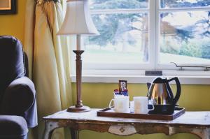 Príslušenstvo na prípravu kávy alebo čaju v ubytovaní Melbourne Lodge