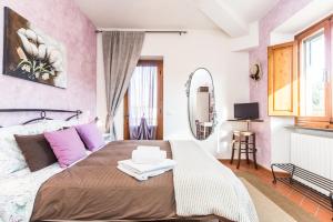 Postel nebo postele na pokoji v ubytování B&B Grano e Lavanda