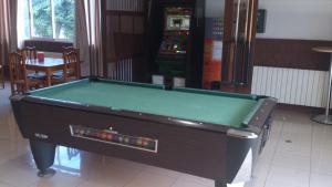 a pool table sitting inside of a room with at Hostal Imperial in Crevillente