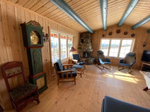 Posezení v ubytování Løstegård Cabins