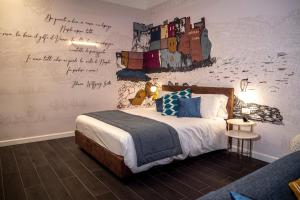 Un pat sau paturi într-o cameră la Galleria Sanfelice