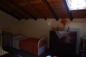 Cama o camas de una habitación en Casa Vacanza La Papuzza Mare e Etna