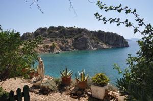 a view of a small island in the water at Lalezas Studios in Tolo
